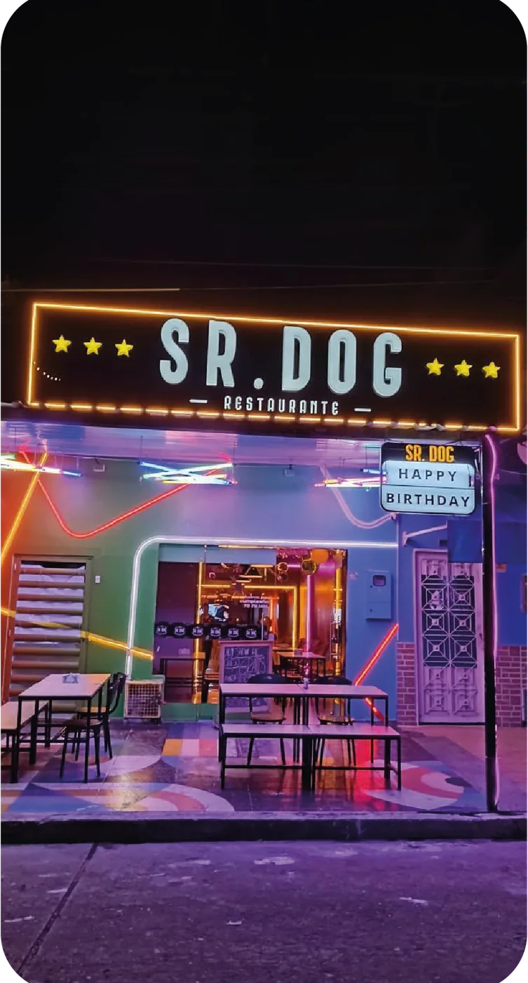 Aviso luminoso del restaurante SR. DOG instalado en fachada